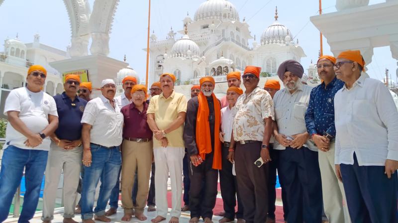 Biju BP, who went on a country tour on girl education and empowerment campaign, paid obeisance at Harmandir Sahib