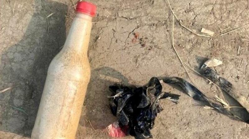 BSF troops recovered one bottle filled with suspected heroin