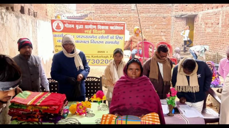 Distribution of blankets in Dalit settlements on behalf of Gautam Buddha Rural Development Foundation.