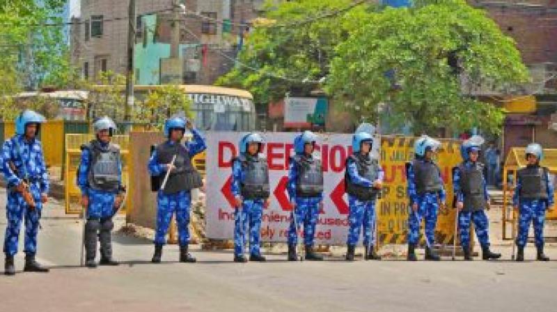 Delhi: Heavy deployment of security forces at Municipal Corporation building in view of Mayor's election.