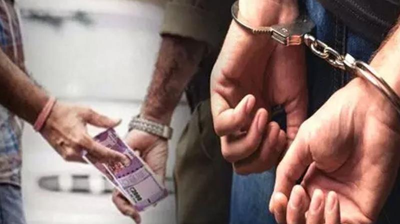 Police Inspector and middleman arrested for taking bribe