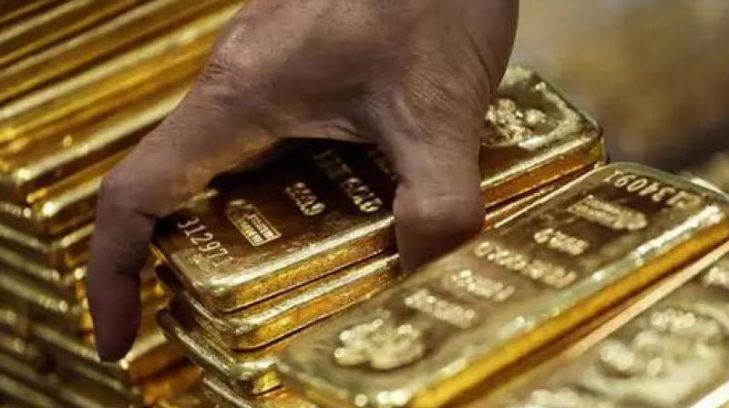 1.7 kg gold seized from two passengers at Hyderabad airport