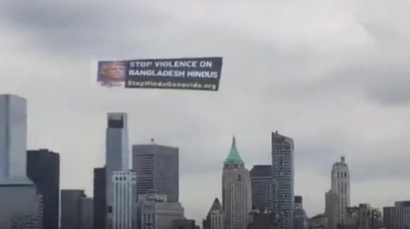 stop violence on bangladeshi hindus banner in newyork news in hindi  