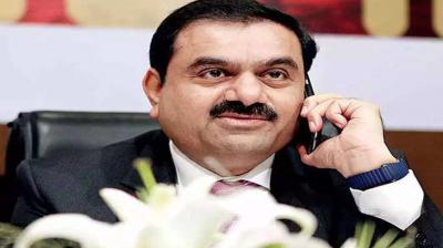 Shares of six Adani group companies rose, four fell