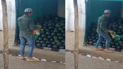 Tricolor insulted in UP, man seen cleaning watermelon with flag! you also see